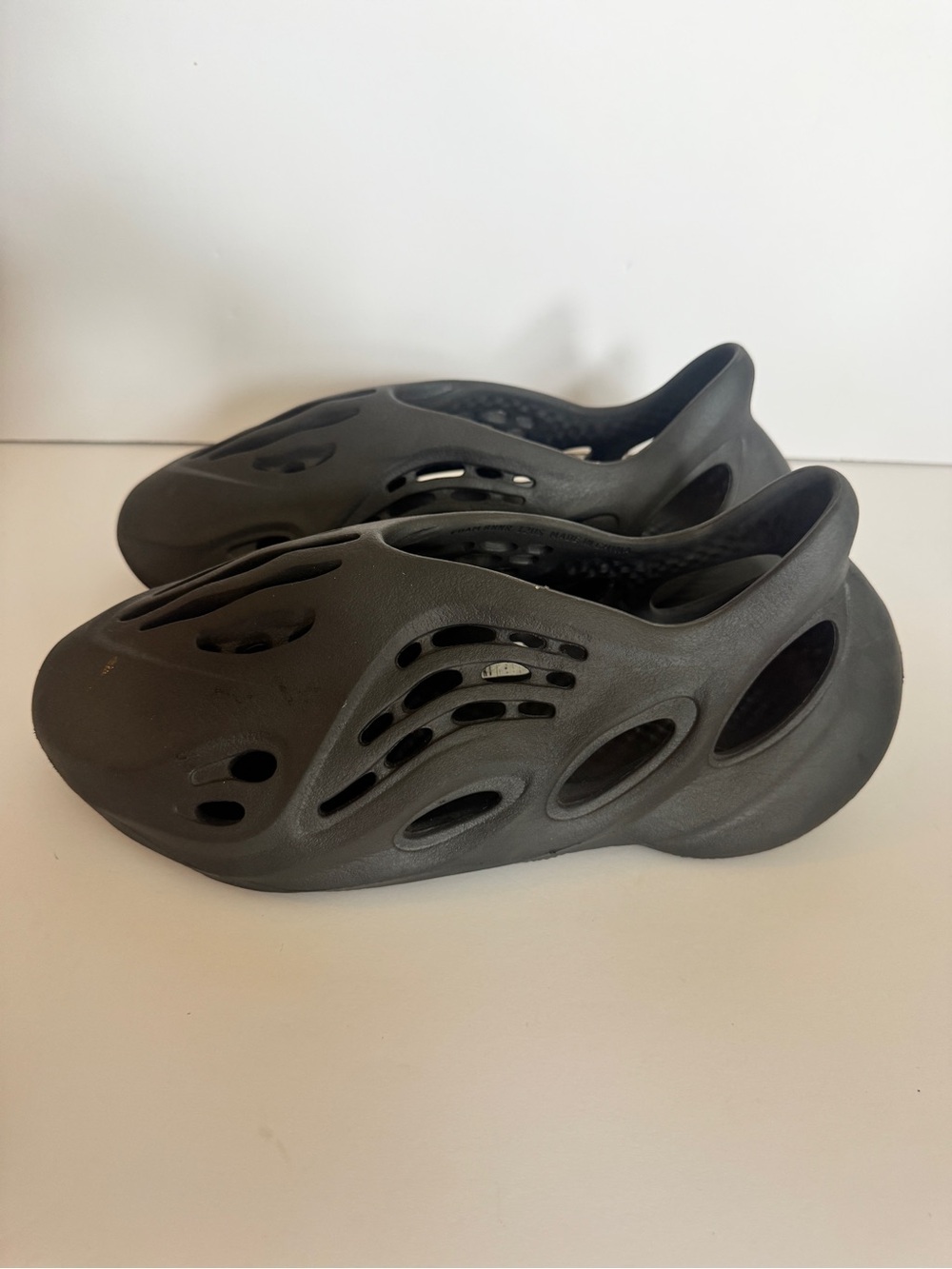 adidas Yeezy Foam RNR Men’s Black Foam Slip-On Sandals with Vent Holes